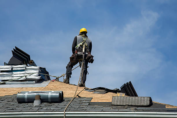 Professional Roofing technician working in Cannon Beach, OR